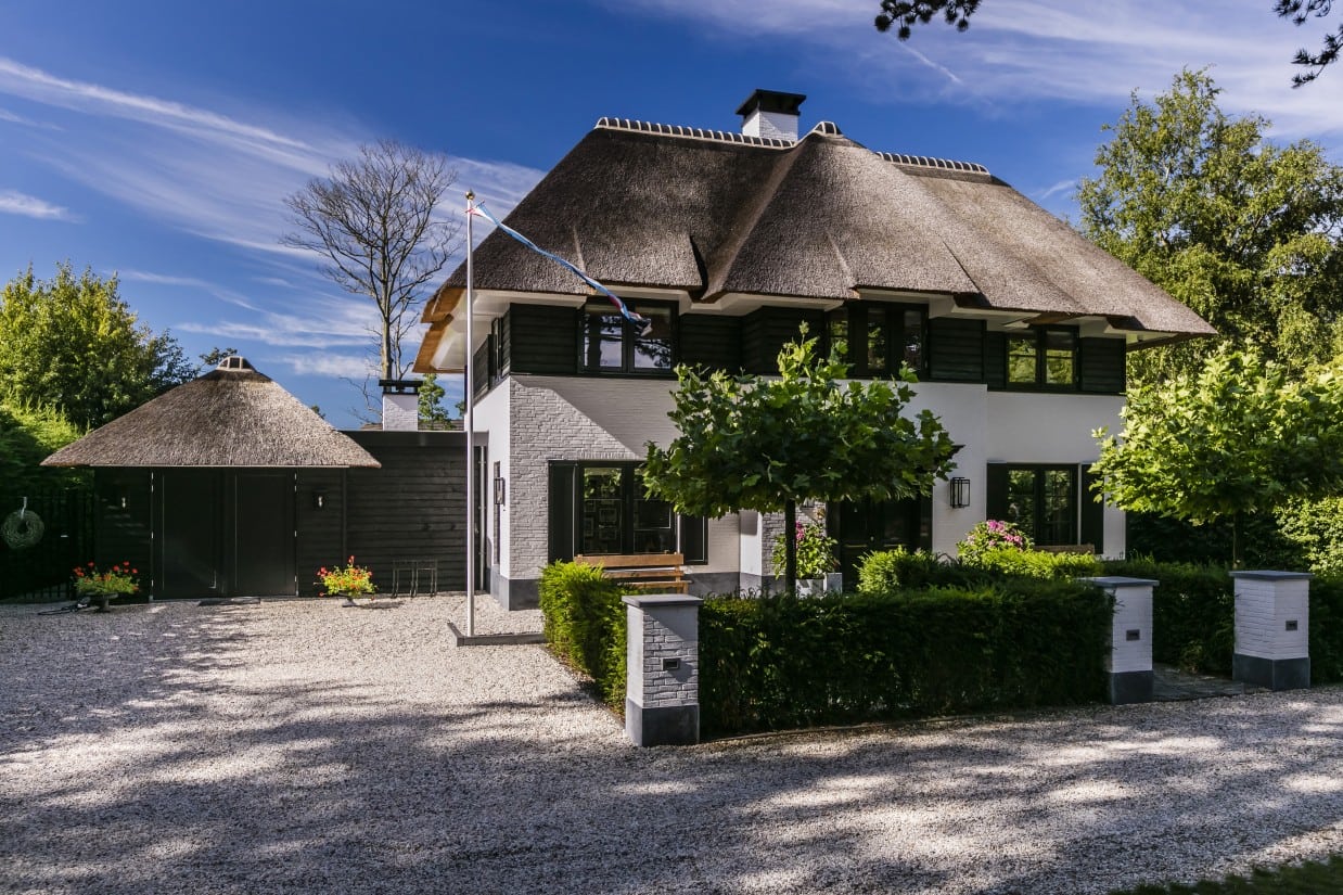 Rietgedekte villa bouwen Warmond